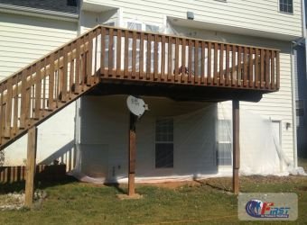 Wooden deck before pressure washing