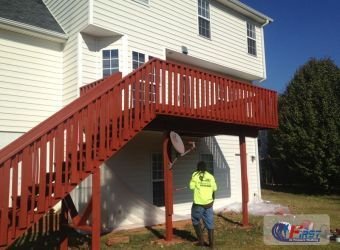 Clean wooden deck after pressure washing