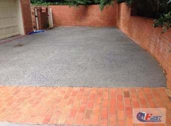 Clean asphalt driveway after pressure washing