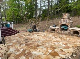 Clean stone patio after pressure washing