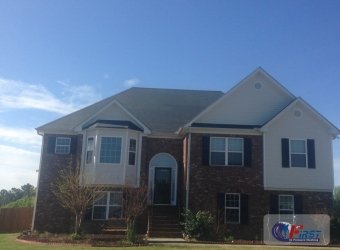 Clean shingle roof after roof cleaning