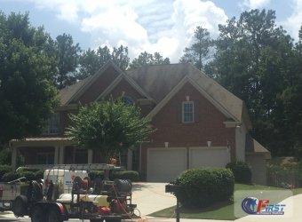 House roof before professional roof cleaning