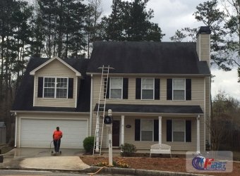 Dirty shingle roof before roof cleaning