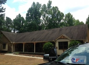 Dirty roof before roof cleaning