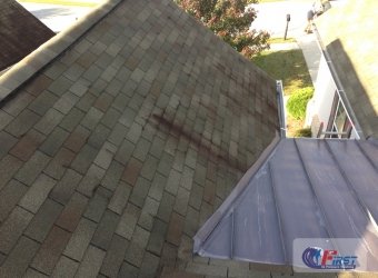 Dirty roof shingles before roof cleaning
